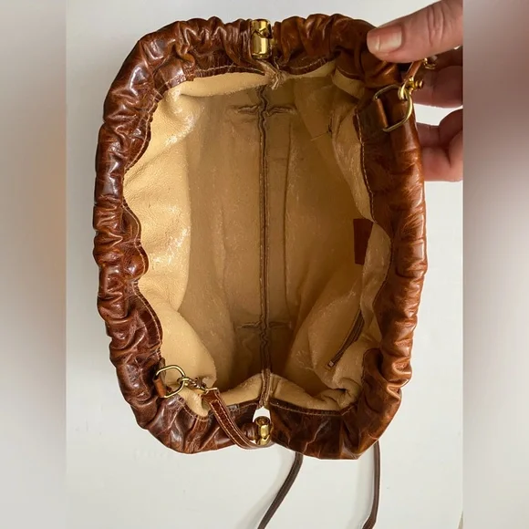Furla Suede Vintage Brown Crossbody Gold Hardware looks like tiny cat paw prints